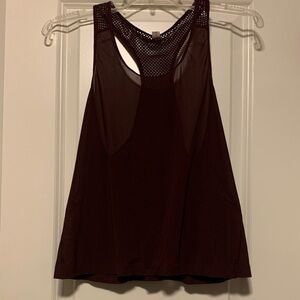 Lululemon Athletica Burgundy Mesh Top
Size 6, Good Condition